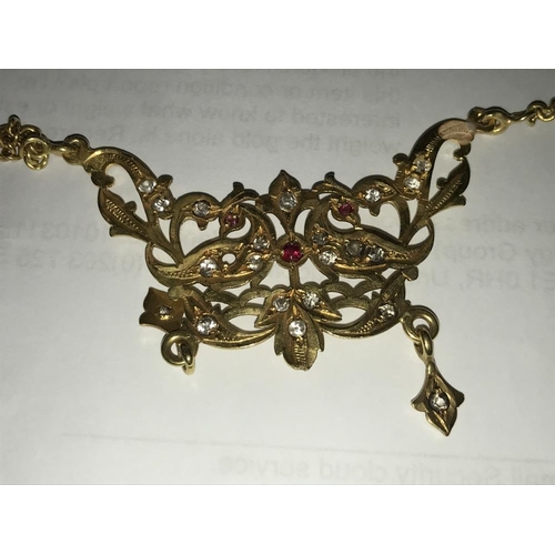 131 - A necklace on long chain, (tests as 24ct gold) 30 grams.