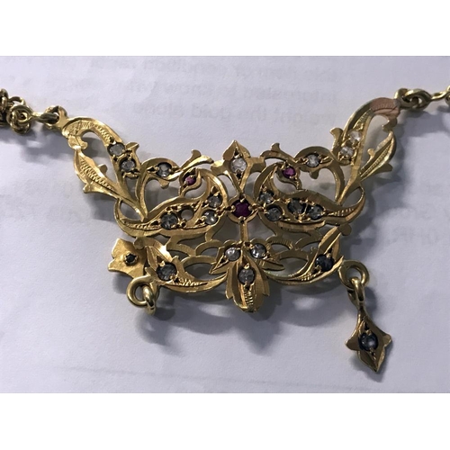 131 - A necklace on long chain, (tests as 24ct gold) 30 grams.