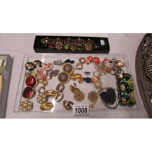 1008 - A collection of vintage earrings including Monet, 20 pairs for pierced ears, 15 clip on and 3 bracel... 