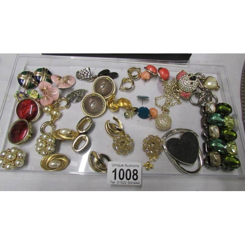 1008 - A collection of vintage earrings including Monet, 20 pairs for pierced ears, 15 clip on and 3 bracel... 