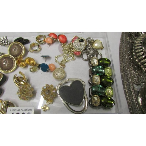 1008 - A collection of vintage earrings including Monet, 20 pairs for pierced ears, 15 clip on and 3 bracel... 