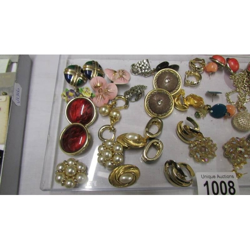 1008 - A collection of vintage earrings including Monet, 20 pairs for pierced ears, 15 clip on and 3 bracel... 