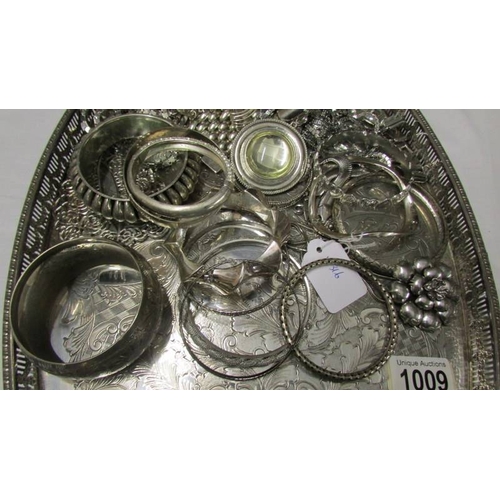 1009 - A Viners of Sheffield silver plate tray, a silver bracelet, a silver ring set pink stone, a silver n... 