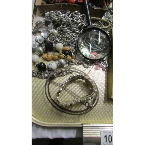 1013 - A tray of assorted costume jewellery including rings, bracelets etc.,