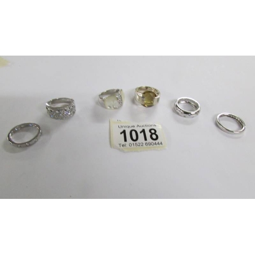 1018 - 6 assorted silver rings.