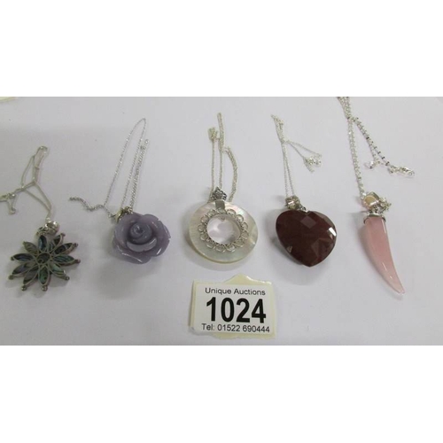 1024 - 5 silver and stone pendants.