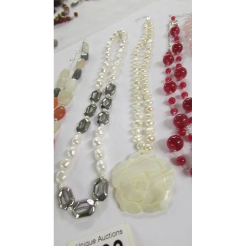 1033 - 6 assorted stone necklaces in various colours.