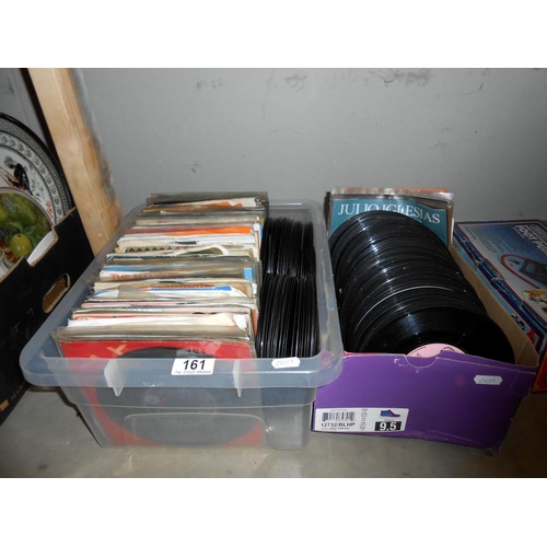 161 - 2 boxes of 45rpm records including Abba, Bee Gees, Kylie, Elton John etc. The box on the right has a... 