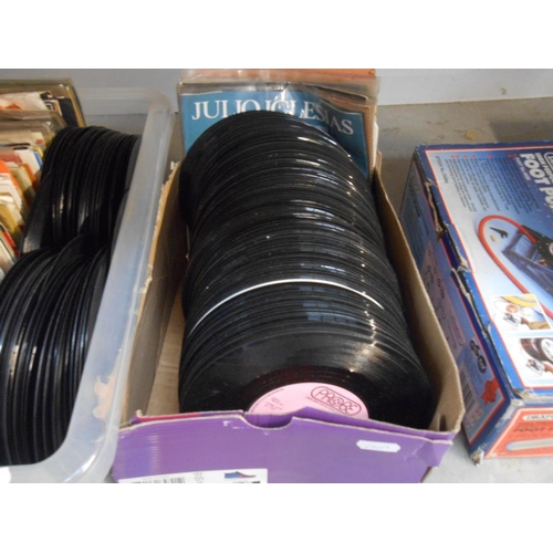 161 - 2 boxes of 45rpm records including Abba, Bee Gees, Kylie, Elton John etc. The box on the right has a... 