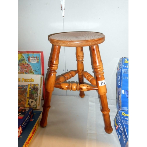 174 - A 3 legged stool with turned legs