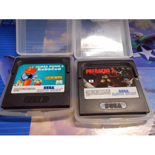 176 - A Sega Game Gear with approx 9 games (condition unknown, sold as seen)