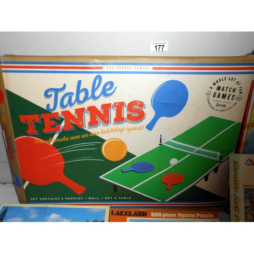 177 - A quantity of games and jigsaws including The Battle of Little Big Horn and table tennis