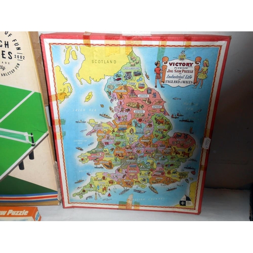 177 - A quantity of games and jigsaws including The Battle of Little Big Horn and table tennis