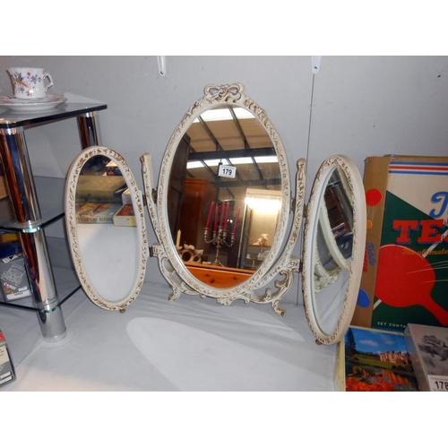 179 - A French ormalu style triple oval dressing table mirror