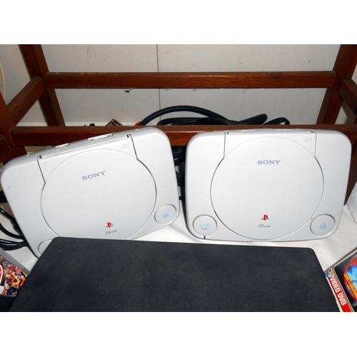 190 - Two Sony PS1 consoles and a Sony PS3 and leads (condition unknown, sold as seen)