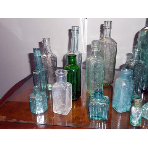 192 - A quantity of antique glass bottles