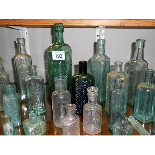 192 - A quantity of antique glass bottles