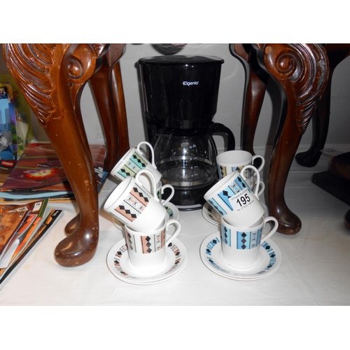 195 - 8 Ridgeway Masquerade bone china coffee cups and saucers along with a coffee perculator