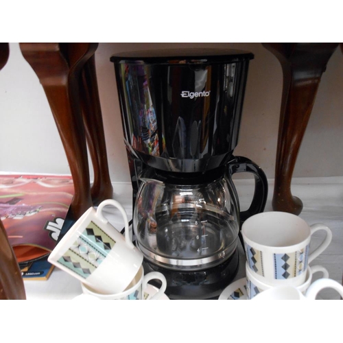 195 - 8 Ridgeway Masquerade bone china coffee cups and saucers along with a coffee perculator