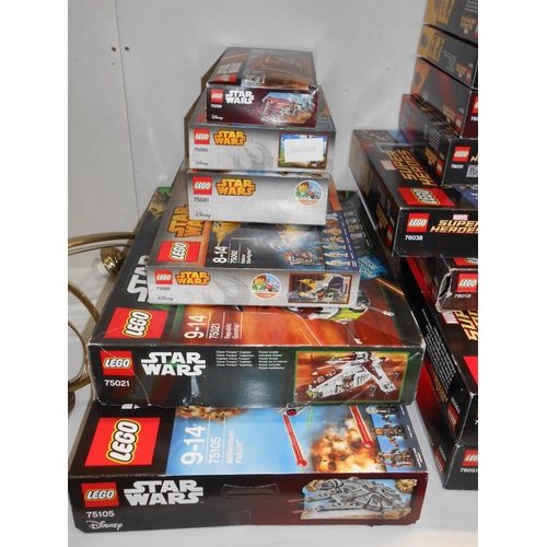 196 - A huge lot of Lego including Star Wars, Super Heroes, Elves and Friends, all boxes are empty and the... 