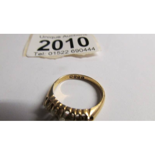 2010 - A five stone vintage 18ct gold 4.2 gram diamond ring, size J.