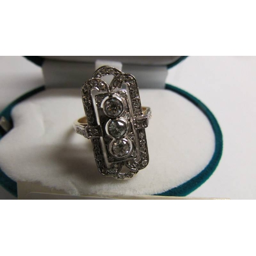 2015 - An ornate 18ct gold ring set approximately 1.2 carat diamonds, size N. A/F (missing 1 diamond)