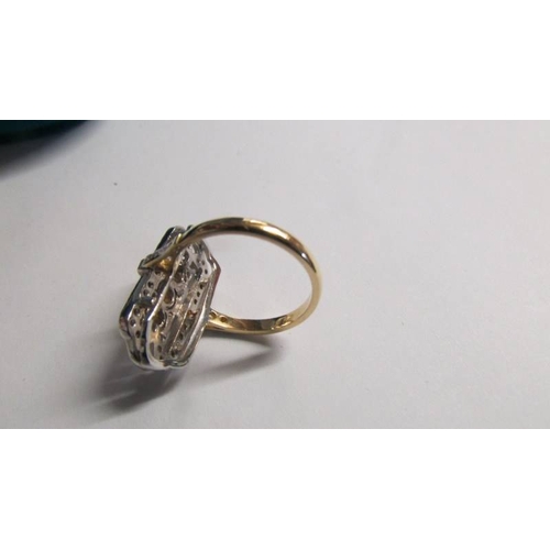 2015 - An ornate 18ct gold ring set approximately 1.2 carat diamonds, size N. A/F (missing 1 diamond)