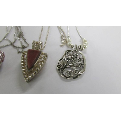 2017 - 6 assorted silver pendants.