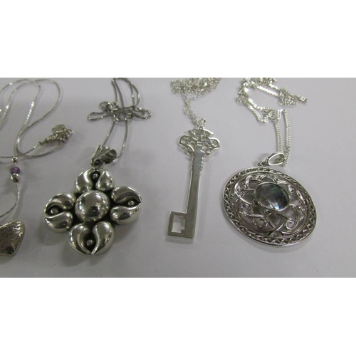 2020 - 6 assorted silver pendants.