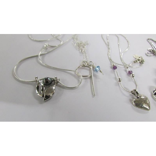 2020 - 6 assorted silver pendants.