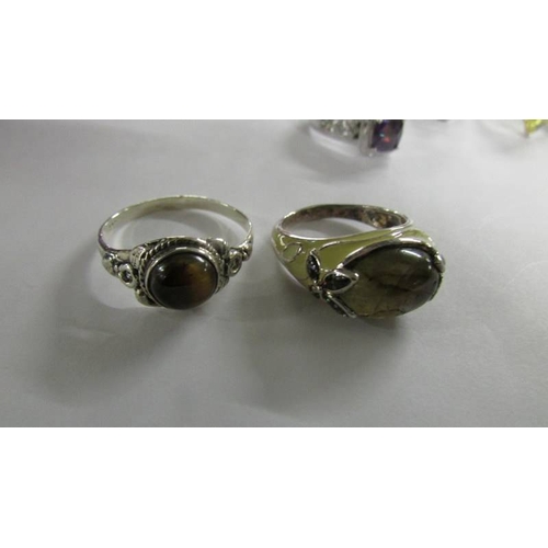 2030 - 7 silver rings and an unmarked ring,