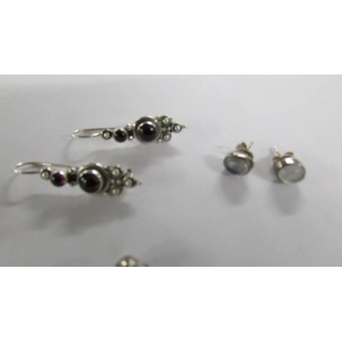 2031 - 8 pairs of assorted silver earrings.