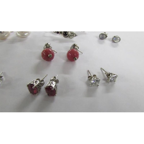 2031 - 8 pairs of assorted silver earrings.