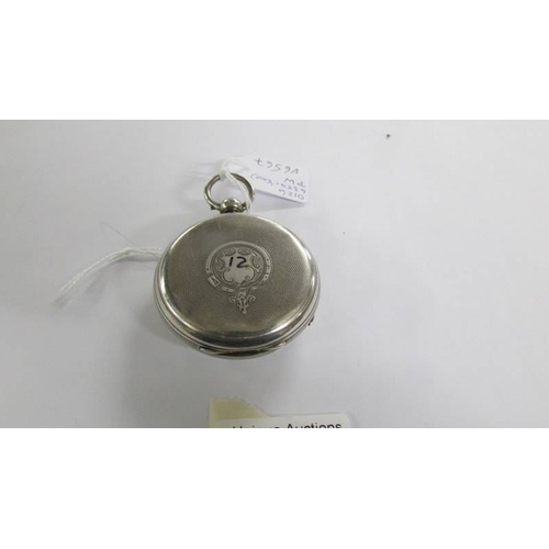 2041 - An open faced silver key wind pocket watch, London hallmark.