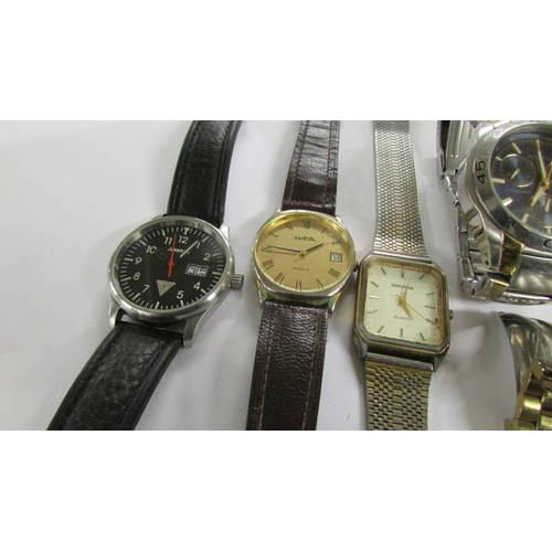 2047 - Seiko and Accurist chronograph wrist watch together with 9 other gent's quartz watches.