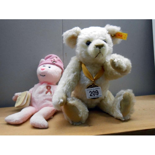 209 - A Steiff Danbury Mint Millenium 2000 bear and a hope breast cancer charity bear