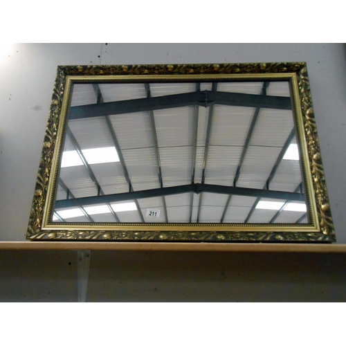 211 - A large gilt framed bevelled edged mirror size 86cm x 61cm