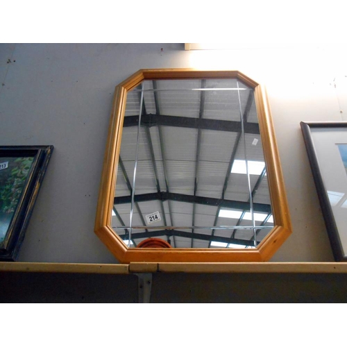 214 - A pine framed mirror, size 67cm x 53cm