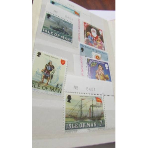 2158 - Approximately 70 unused and different Isle of Man stamps.