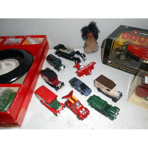 218 - Quantity of diecast including Lledo, Matchbox, Burago etc, including a boxed roulette set