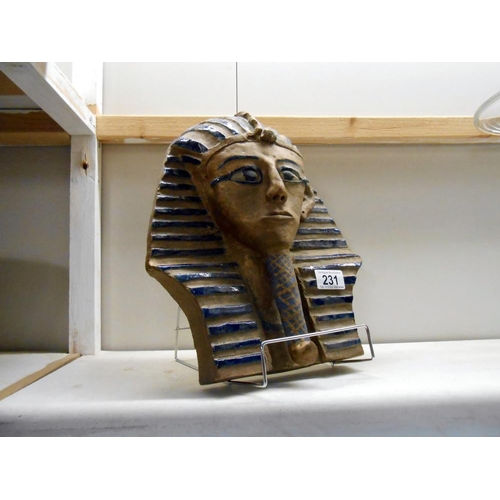 231 - A clay model of Tutankhamun death mask, a/f