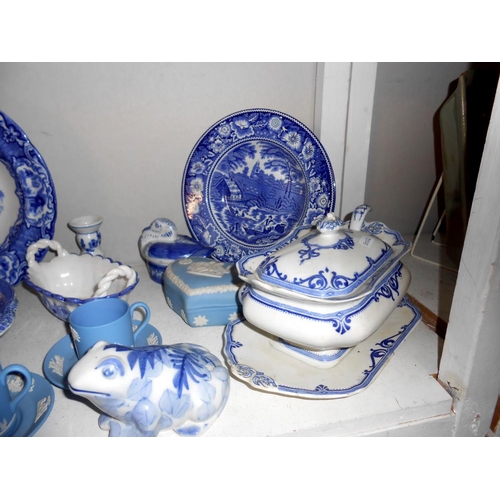 237 - A shelf of blue and white and a quantity of Wedgwood (small tureen is slightly a/f)