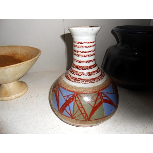 244 - 4 items of pottery by studio pottery artist Harry Shotton