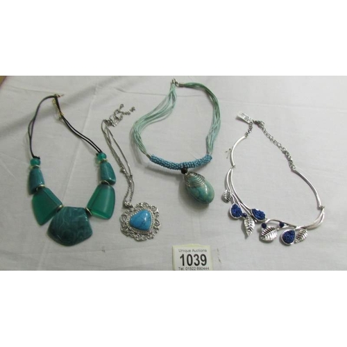 1039 - A white metal leaf necklace set blue stones and 3 turquoise coloured necklaces.