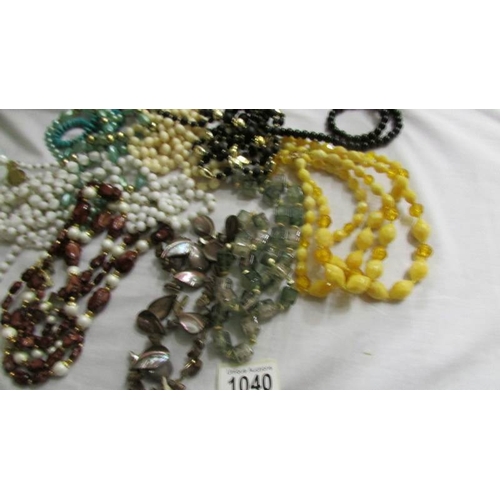 1040 - Approximately 15 bead necklaces.