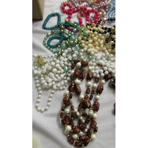 1040 - Approximately 15 bead necklaces.