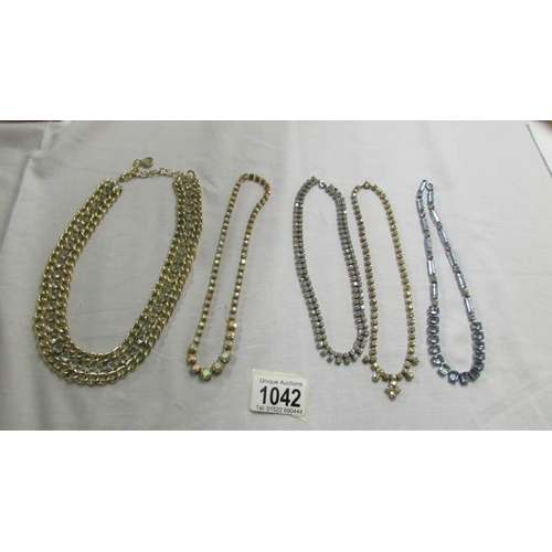 1042 - Five diamonte'/crystal necklaces.