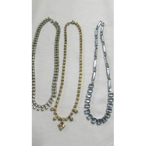 1042 - Five diamonte'/crystal necklaces.