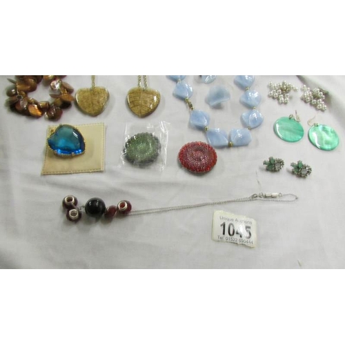 1045 - A mixed lot of pendants, necklaces and earrings.