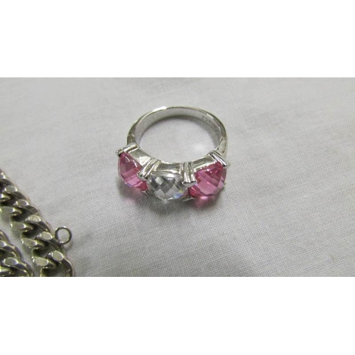 1049 - A silver bracelet with padlock and a Silver 'Rosa' ring with pink stones.